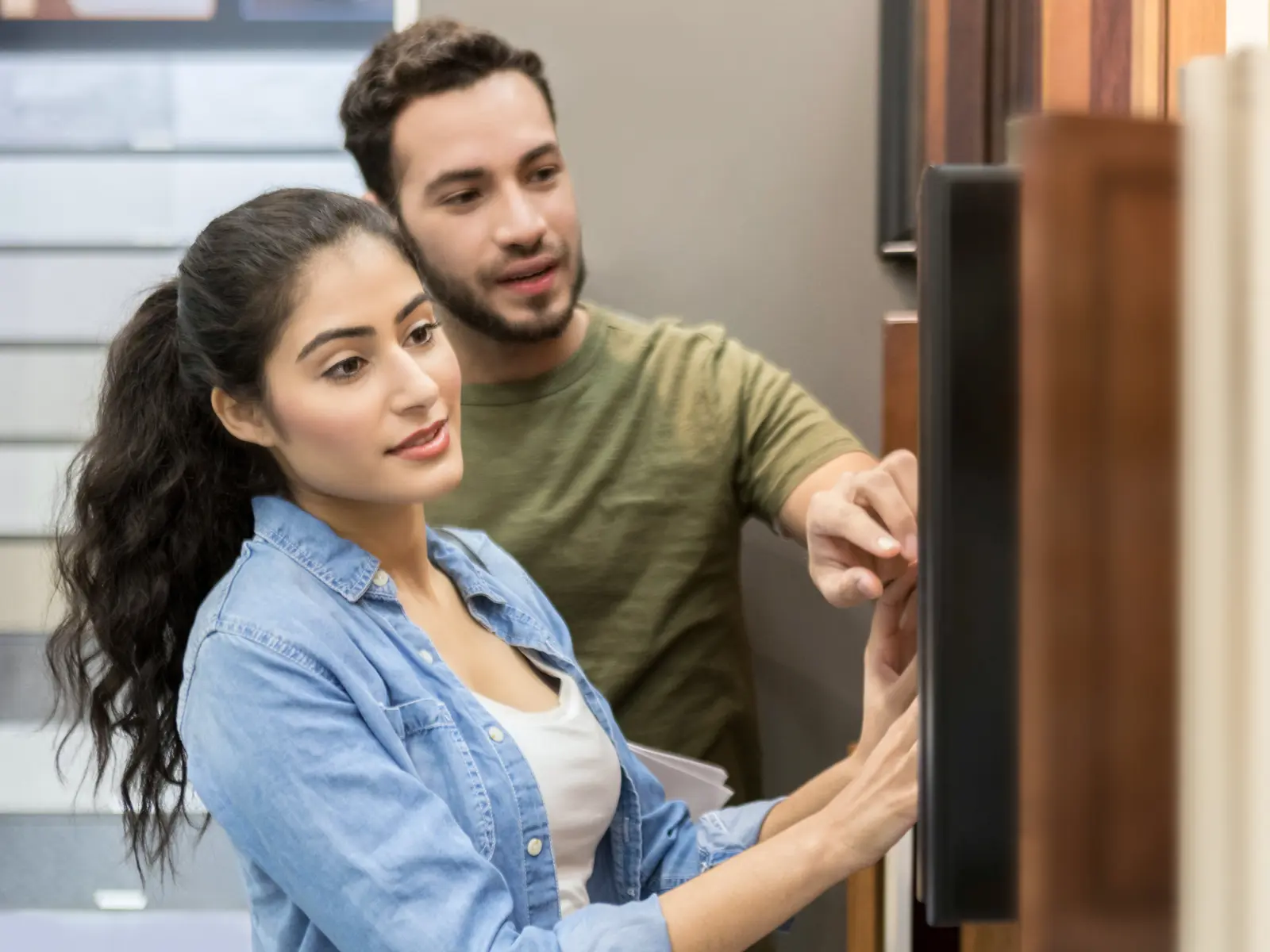 Couple browsing cabinets